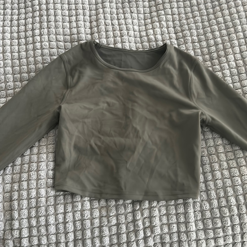 Lululemon long sleeve training top. Olive color. Size 6